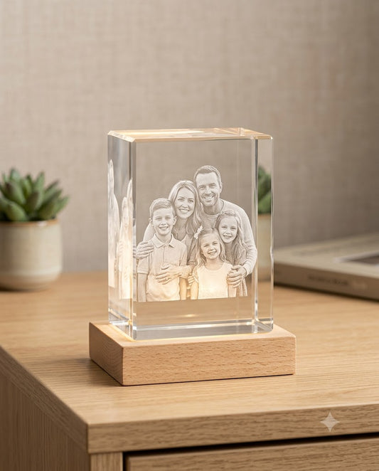 Custom handmade 3D crystal photo portrait with engraved family photo on a lit wooden base